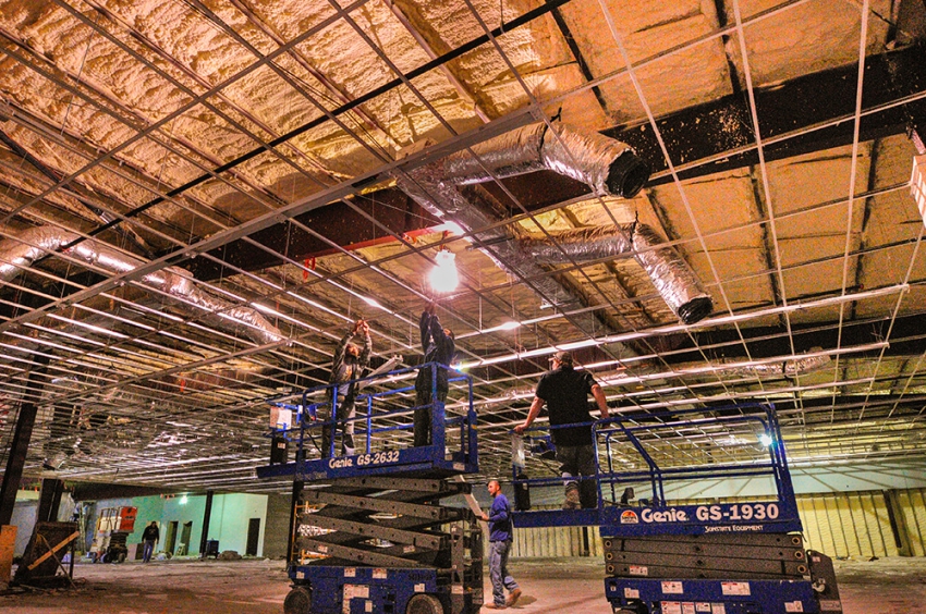 Framing, installation, and duct work curing construction phase of large commercial building in Wimberley, Texas.