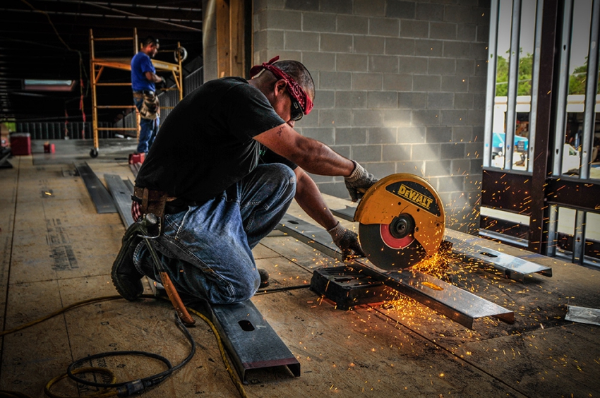 S.B. Thompson Contractor cutting steel for framing of commercial building in Canyon Lake, Texas.