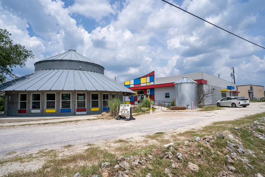 Silo glass in San Marcos, Texas. Unique colorful commercial building custom built by S.B. Thompson Construction.